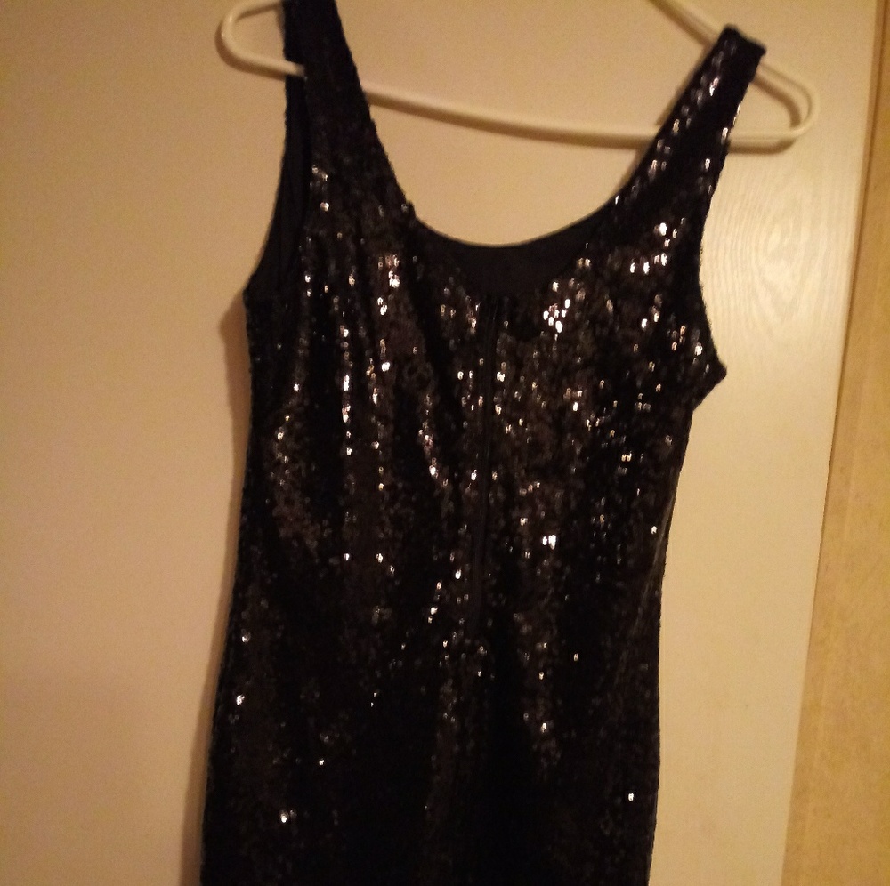 Sequined little black dress